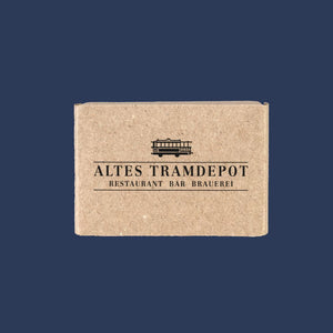 Kartonverpackung der Seife mit Tramdepot Logo drauf.