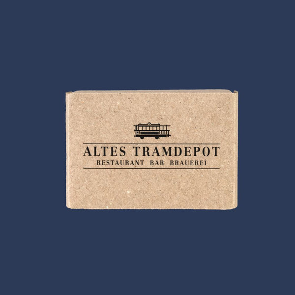 Kartonverpackung der Seife mit Tramdepot Logo drauf.